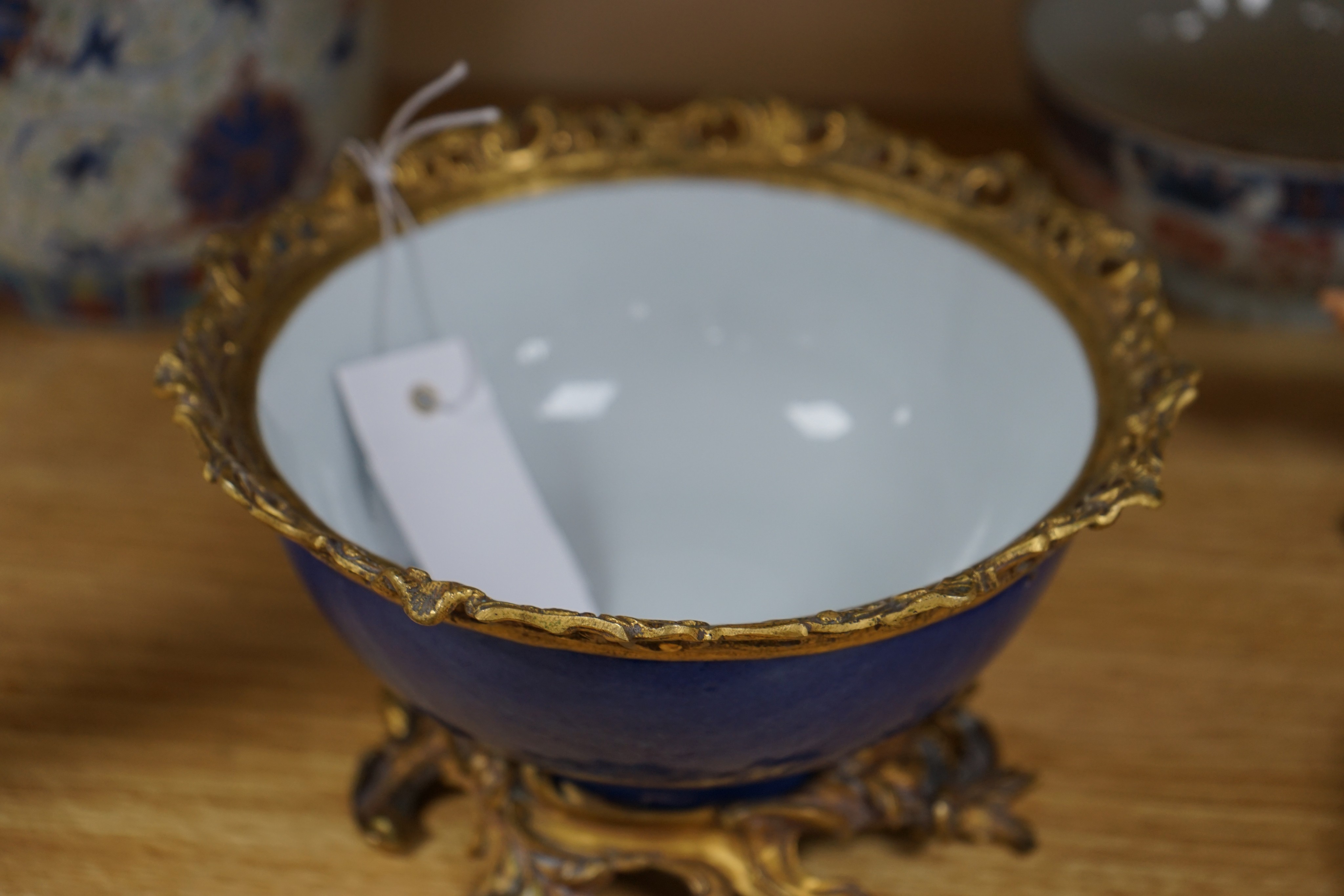 An 18th century Chinese clobbered blue and white bowl, a Samson powder blue ormolu mounted bowl, 19.5cm wide and a 19th century Chinese doucai style jar